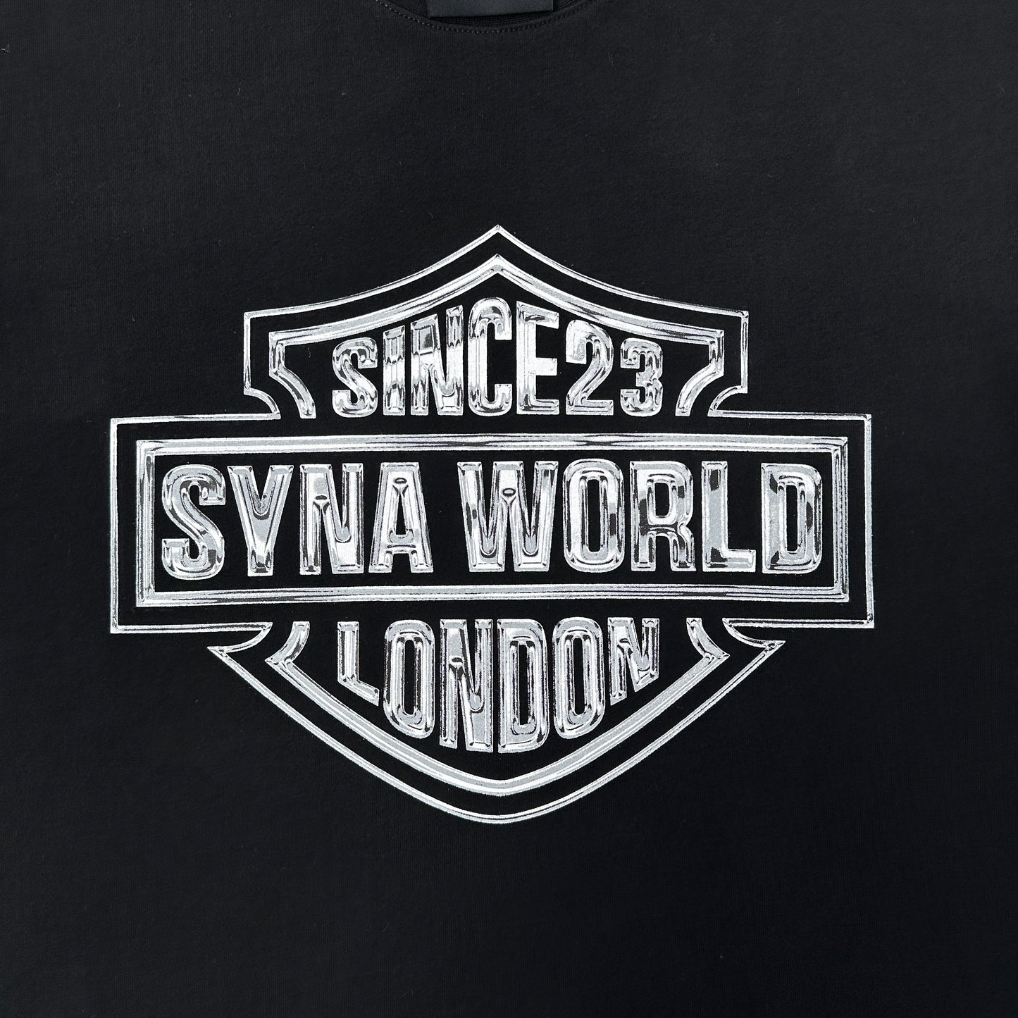 Syna World Chrome Badge Tee - (BLACK)