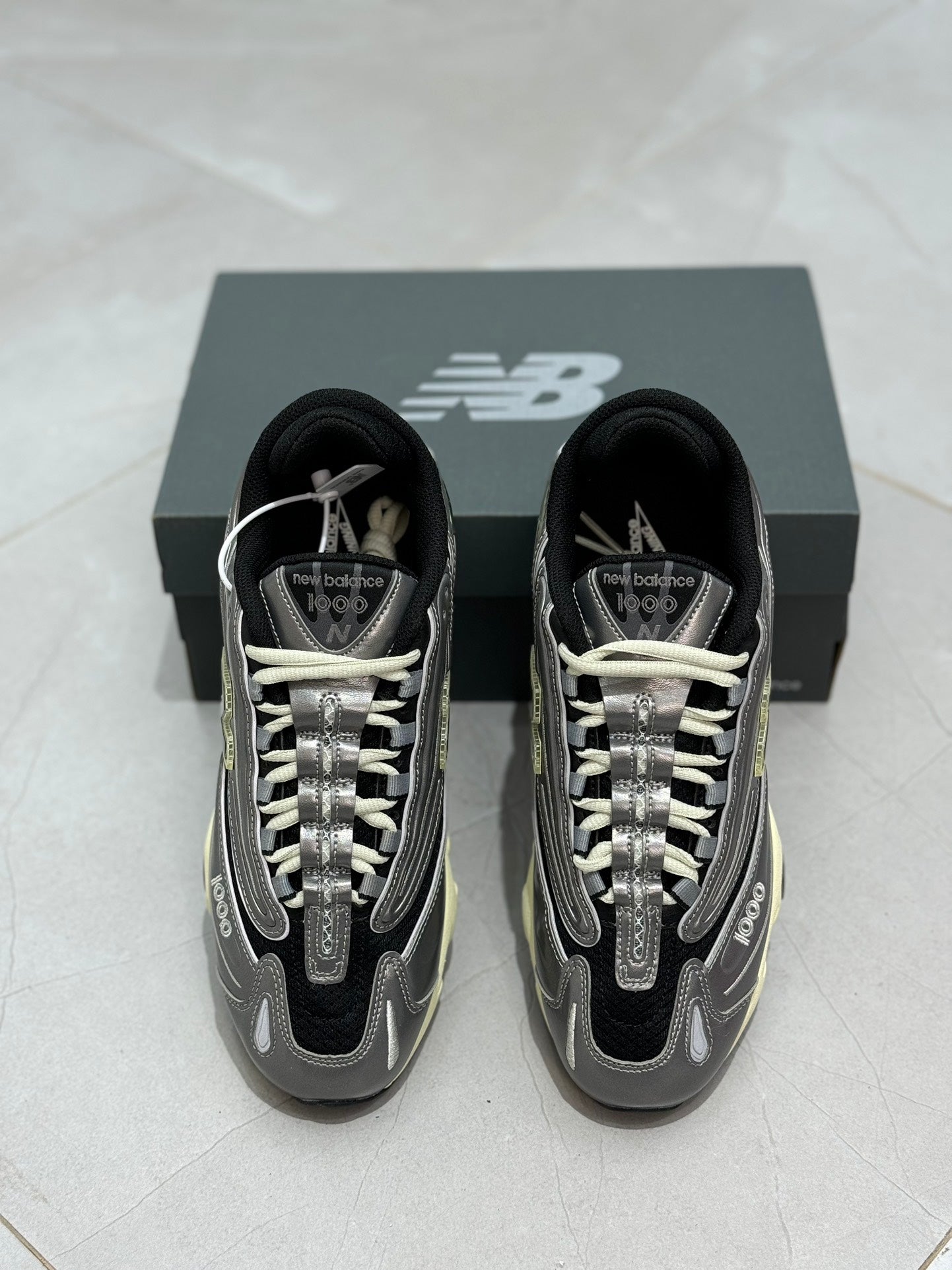 New Balance 1000 - (SILVER METALLIC BLACK DAWN GLOW)